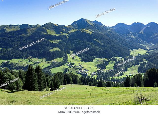 Austria, Kleinwalsertal (little Walser valley), view over Mittelberg (municipality) and to the Walser Hammerspitze (mountain) (the middle of the picture)