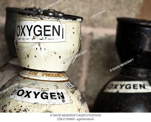 old disused oxygen cylinders, background