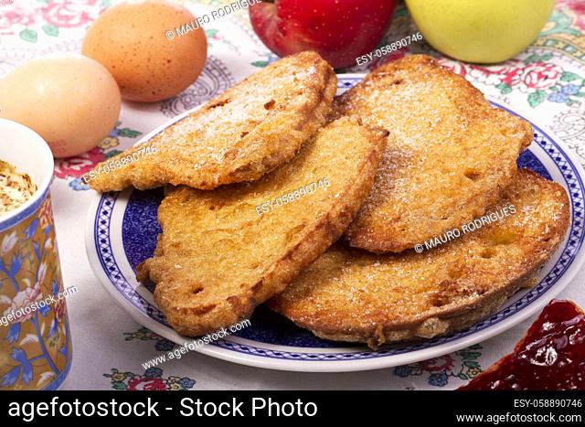 Close up view detail of several golden slices of bread sprinkled with sugar