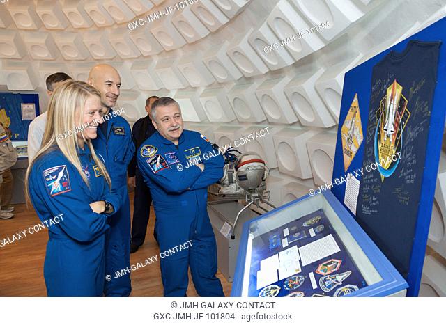 In Baikonur, Kazakhstan, Expedition 34 backup crew members Karen Nyberg of NASA (left), Luca Parmitano of the European Space Agency (center) and Fyodor...