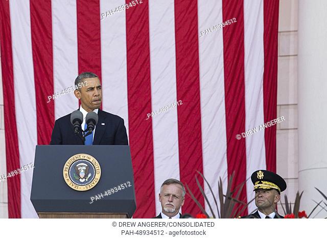 United States President Barack Obama delivers remarks during a Memorial Day event at Arlington National Cemetery, May 26, 2014 in Arlington, Virginia