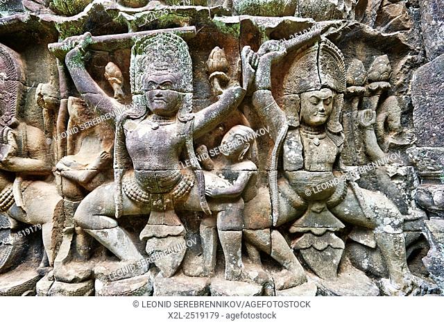 Fragment of bas-relief on Terrace of the Elephants in Angkor Thom temple complex. Angkor Archaeological Park, Siem Reap Province, Cambodia