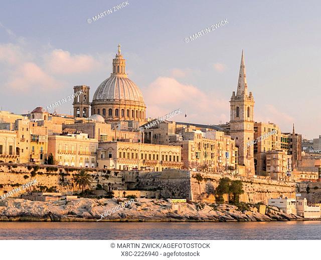 Valletta, the capital of Malta and listed as UNESCO world heritage. Valletta during sunset and Marsamxett Harbour. Europe, Southern Europe, Malta, April