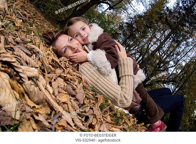 mother and daughter in autumn . - 11/10/2007