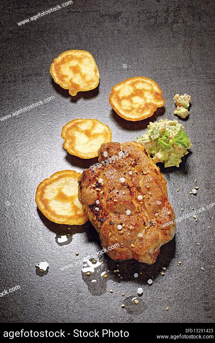 Grilled pork collar steak with guacamole and spelt pancakes