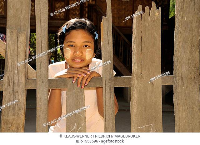 Girl with thanaka paste on her face, Burmese make-up, a village near Bagan, Myanmar, Burma, Southeast Asia, Asia