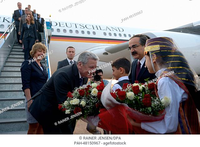 German President Joachim Gauck and his partner Daniela Schadt leave the government plance at the airport in Adana,  Turkey, 26 April 2014