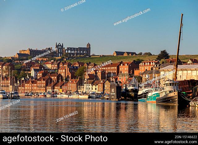 Whitby, North Yorkshire, England, UK - May 09, 2016: View over the Whitby skyline and the River Esk, seen from the Whitehall Landing