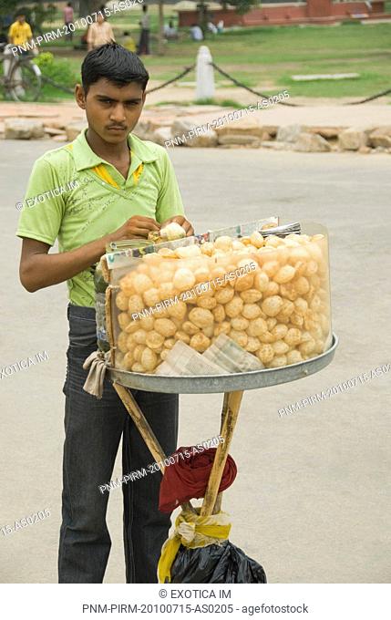 Vendor selling panipuri at a food stall, India Gate, New Delhi, India