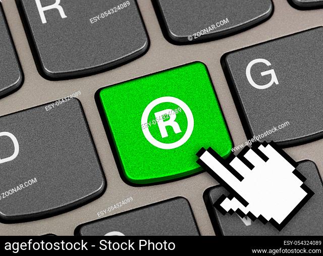 Computer keyboard with Registered mark symbol - business concept