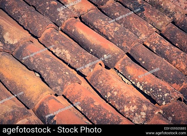 old roof tiles closeup - vintage ceramic roofing