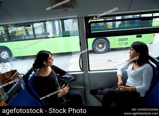 Women sitting in bus
