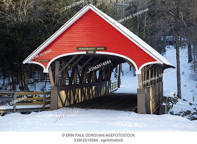 Flume Covered Bridge in Franconia Notch State Park of Lincoln, New Hampshire USA during the winter months. This bridge crosses the Pemigewasset River