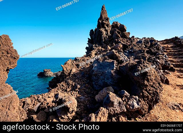 Volcanic coastline landscape. Rocks and lava formations in El Hierro, Canary islands, Spain. High quality photo