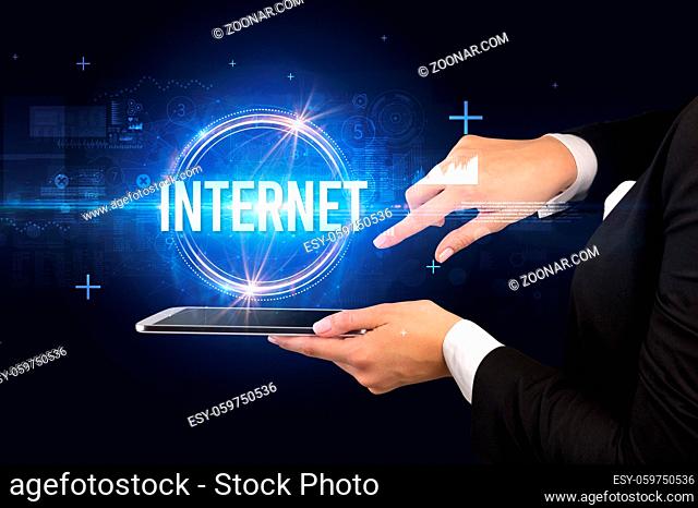 Close-up of a touchscreen with INTERNET inscription, new technology concept