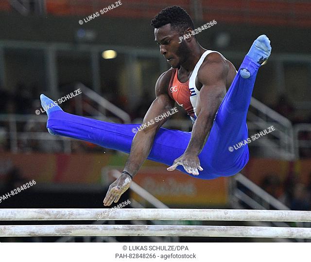 Manrique Larduet of Cuba in action during the Men's Parallel Bars Final of the Rio 2016 Olympic Games in Rio de Janeiro, Brazil, 16 August 2016