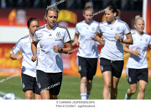 Germany's Lena Goessling (2-L) take part in a training session of the German women's national soccer team as part of the UEFA Women's Euro in Gothenburg, Sweden