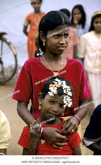 South India- Tamil Nadu Pongal Festival - Two Children Pongal festival falls in the month of January, a festival of Thanks giving to the Sun
