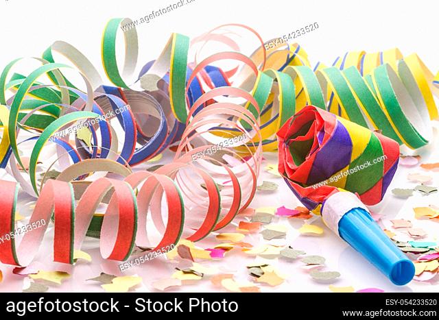 Confetti and garlands decoration for celebration. Isolated on white background