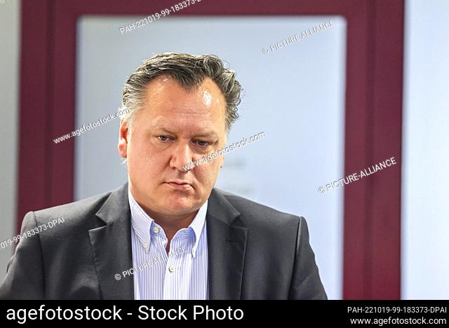 19 October 2022, Schleswig-Holstein, Lübeck: Thomas Nommensen stands in the courtroom after the verdict was announced. The ex-police unionist is accused of...