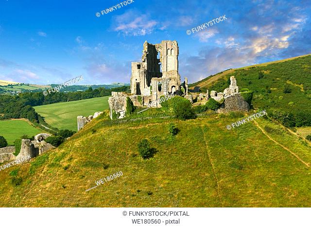 Medieval Corfe castle keep & battlements at sunrise, built in 1086 by William the Conqueror, Dorset England