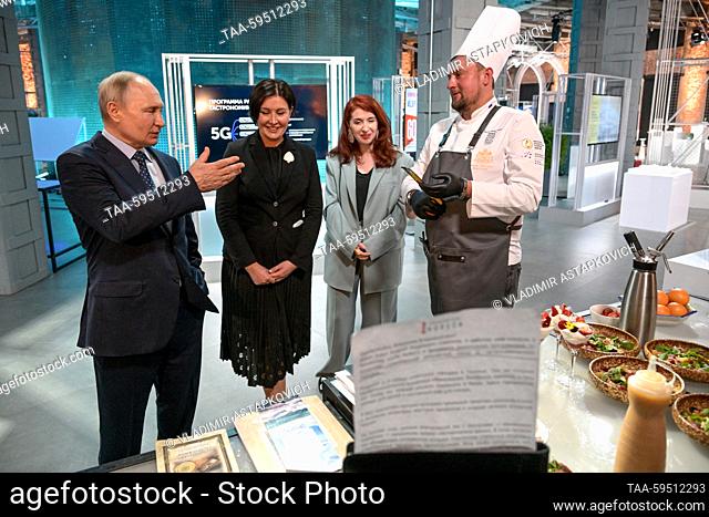 RUSSIA, MOSCOW - MAY 30, 2023: Russia’s President Vladimir Putin and ASI (Agency for Strategic Initiatives) CEO Svetlana Chupsheva (L-R) talk to Doctor Whisky...