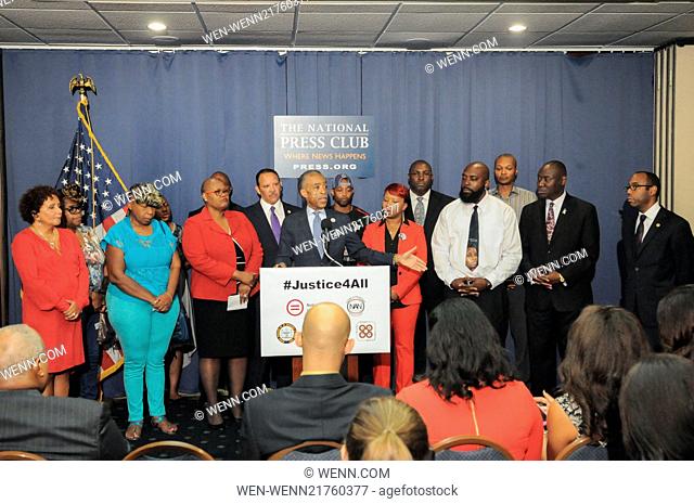 Civil rights leaders join the families of Michael Brown and Eric Garner at a press conference to call for immediate justice and federal review of racial...