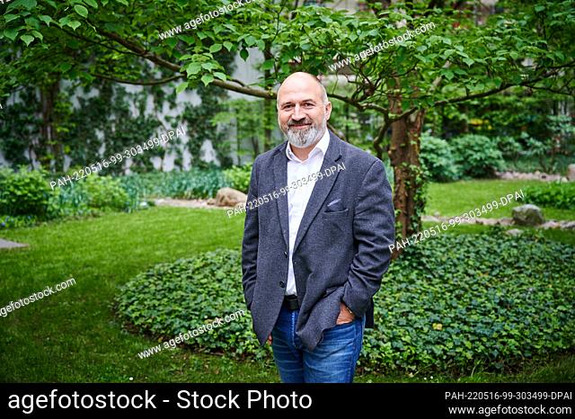 PRODUCTION - 04 May 2022, Berlin: Marc Schmitz, Managing Director of Ströer Content Group GmbH, stands in the courtyard of the T-Online editorial office after...