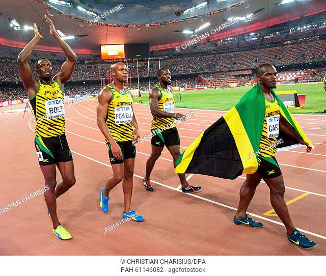 Jamaica's relay team with (L-R) Usain Bolt , Asafa Powell, Nickel Ashmeade and Nesta Carter celebrate after winning the the 4 x 100m Relay final at the 15th...