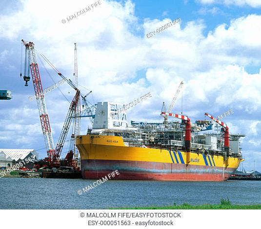 Oil tanker being converted to floating oil production platform. Firth of Clyde, Scotland