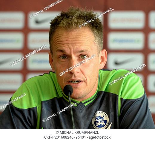 Coach of Sonderjyske Jakob Michelsen speaks at a press conference prior to the fourth qualifying round of the Europa League match Sparta Praha vs Sonderjyske in...