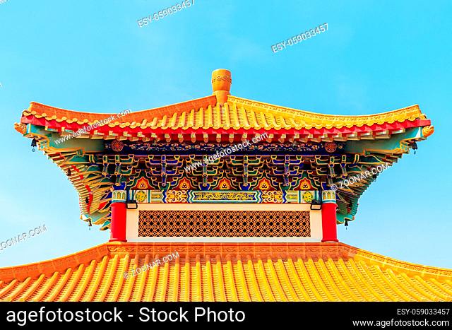 Beautiful Chinese temple roof detail with colorful architectural work at Wat Leng Nei Yi 2, Nonthaburi, Thailand