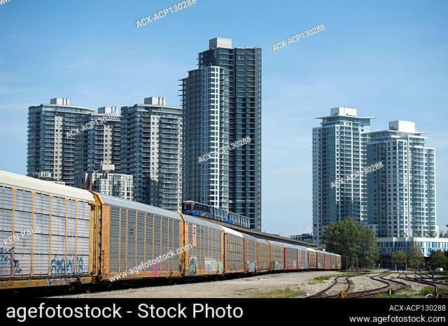 Rail yard, Skytrain and condominiums in New Westminster, British Columbia, Canada