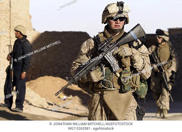 IRAQ Haqlaniyah -- 20 Dec 2006 -- U. S. Marines with 2nd Battalion, 3rd Marine Regiment, Regimental Combat Team 7, I Marine Expeditionary Force (Forward) and an...