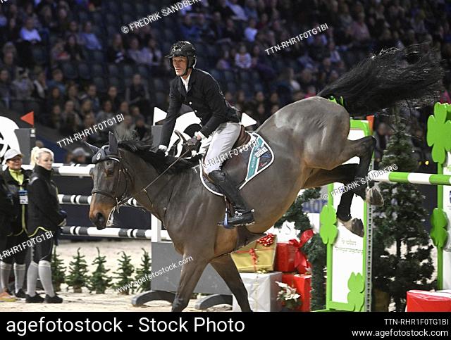 Kevin Staut of France rides the horse Head Over Hills during the international jumping competition at the Sweden International Horse Show at Friends Arena in...