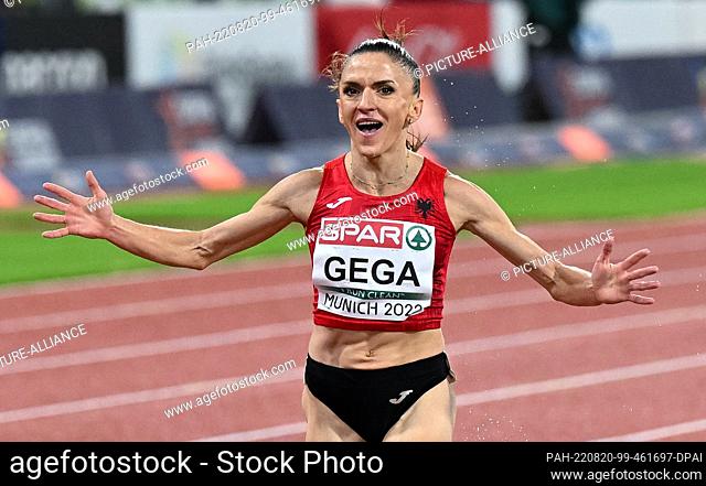 20 August 2022, Bavaria, Munich: European Championships, Athletics, 3000m steeplechase, women, final at Olympic Stadium, Luiza Gega from Albania cheers for gold...