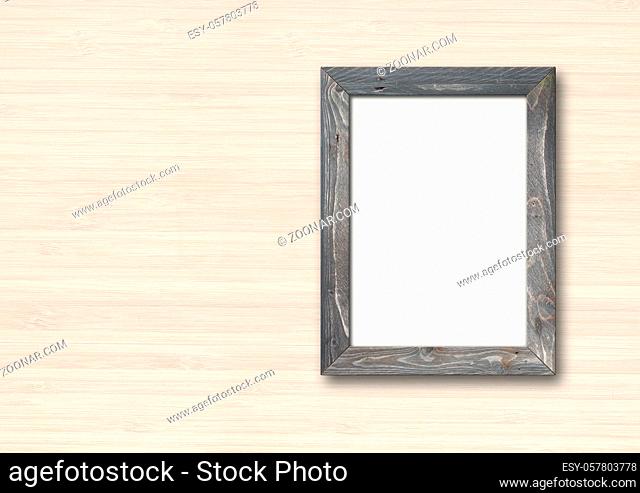 Old grey rustic wooden picture frame hanging on a wood wall. Horizontal banner. Blank mockup template