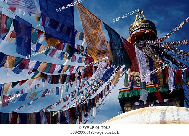 Stupa hung with prayer flags for Tibetan New Year celebrations