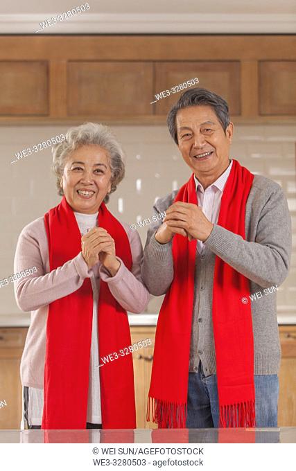 Chinese old couple celebrate the Spring Festival