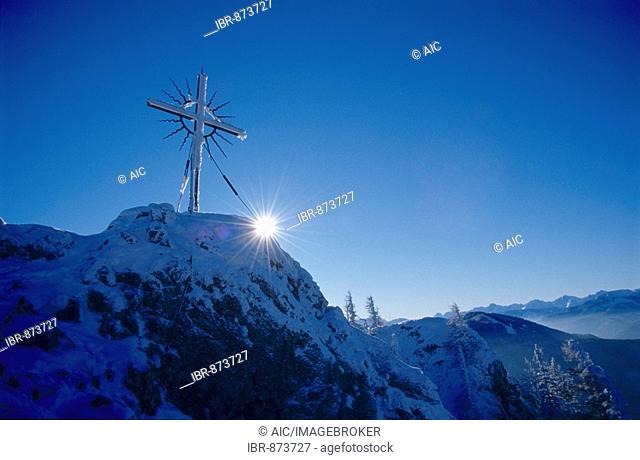 Summit cross on Mt. Steinerner Jaeger, pre-Alps near Reichraming in the winter, Upper Austria, Austria, Europe