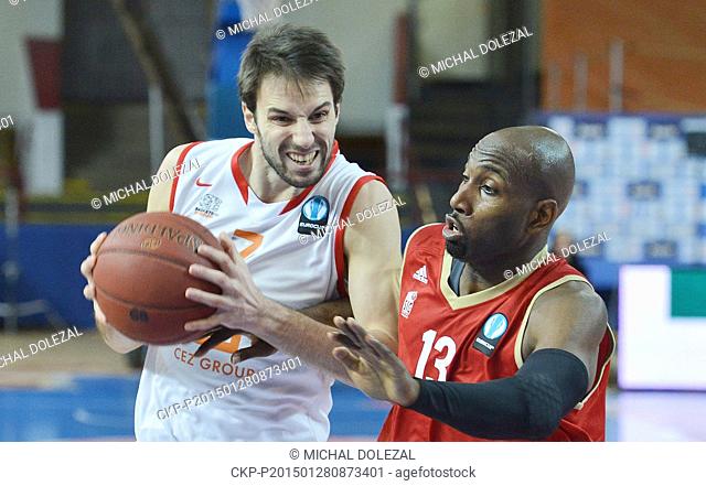 Vojtech Hruban of Nymburk, left, and Louis Campbell of Strasbourg in action during the men's basketball European Cup, Group G group of 16