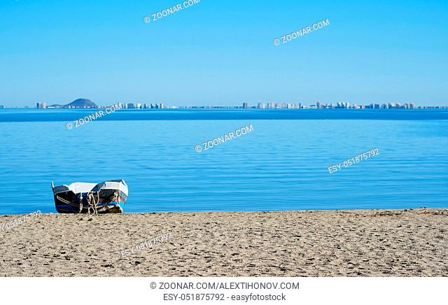 Empty beach of Los Alcazares and view to the La Manga del Mar Menor seaside spit, Spain