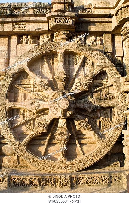 One of several iconic sculptures on walls of 13th century Sun temple World Heritage monument , Konarak , Orissa , India