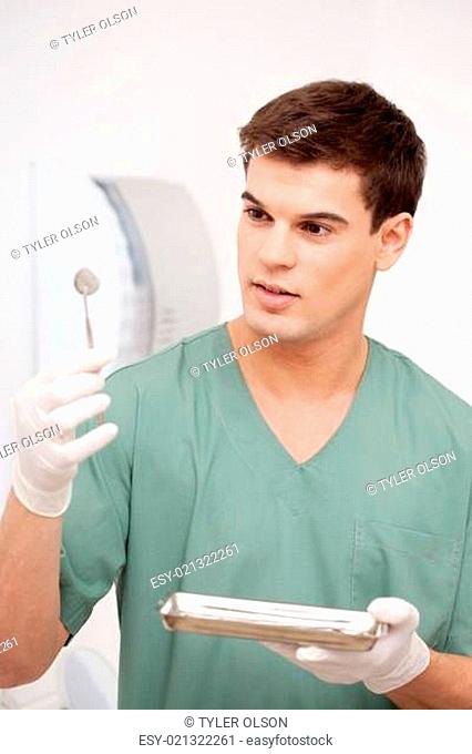 Dentist Inspecting Mirror