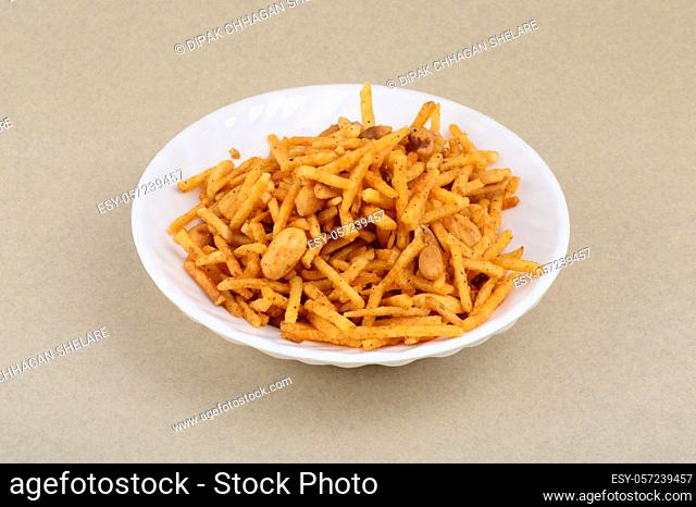 Deep fried salty dish - chivda or mixture made of gram flour and mixed with dry fruits
