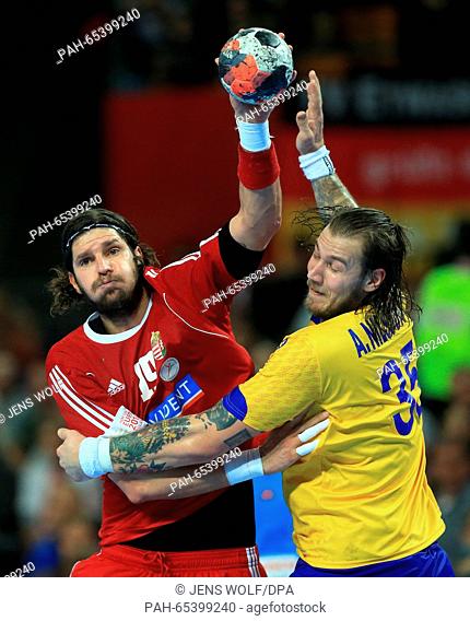 Sweden's Andreas Nilsson (R) in action against Hungary's Laszlo Nagy during during the 2016 Men's European Championship handball group 2 match between Sweden...