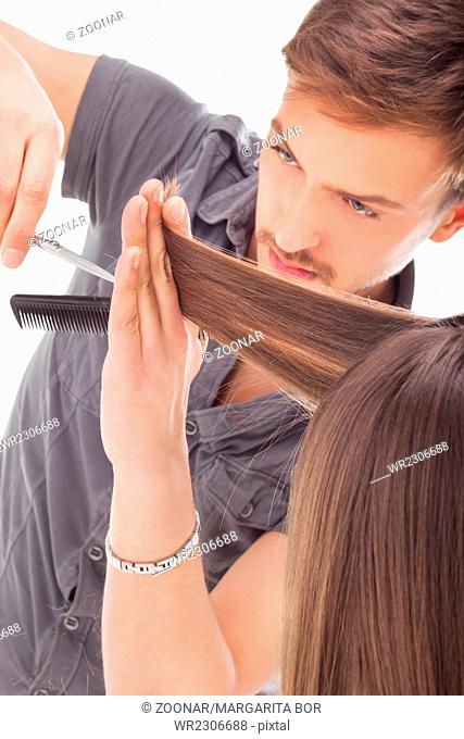 Professional hairdresser with long hair model