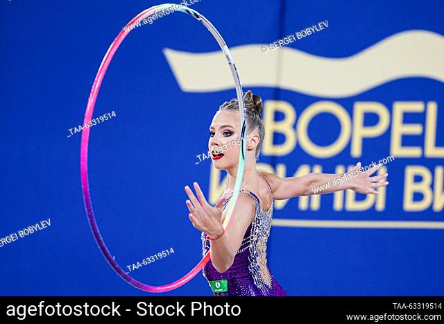 RUSSIA, MOSCOW - OCTOBER 13, 2023: Russia's Ksenia Kolyadina performs her hoop routine in the individual final at the 2023 Cup of the Strongest international...