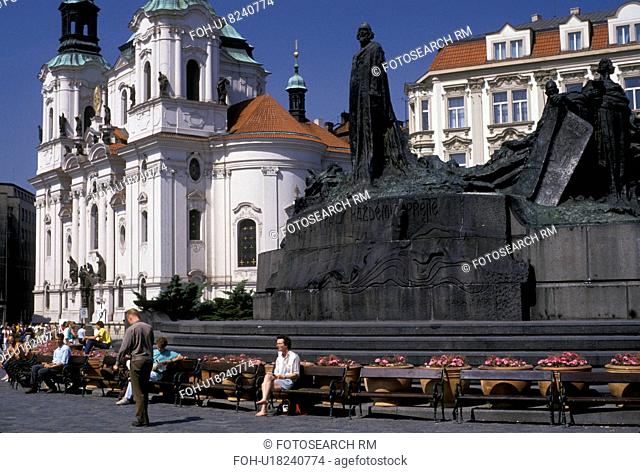 Prague, Czech Republic, Europe, Monument of religious Reformer John Huss in the Old Town Square outside St. Nicholas Church (Kostel Sv