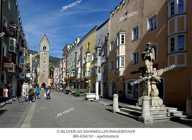 Zwölferturm in the historic centre, Nepomuk monument at the front, pedestrianized area Neustadt, Sterzing, Vipiteno, region of Trentino-Alto Adige, Italy